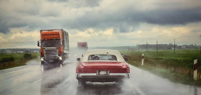 cars on rainy road