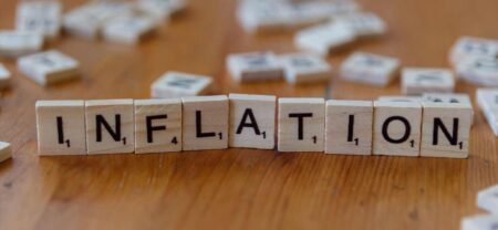 inflation spelled out in scrabble